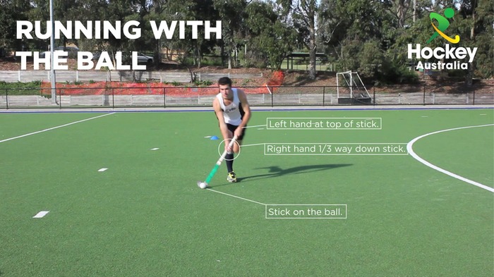 running-with-ball---hockey